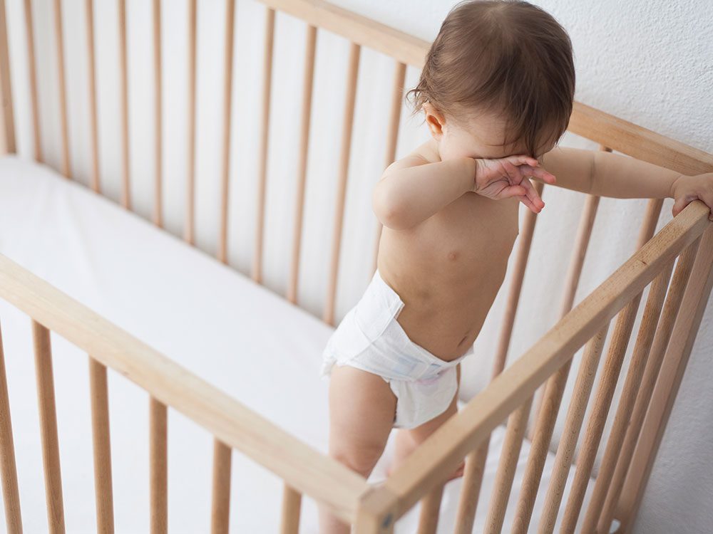 How to Stop Baby Banging Head on Cot